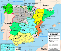 Carte de l'Espagne avec les communautés autonomes en couleur et les capitales de chaque province